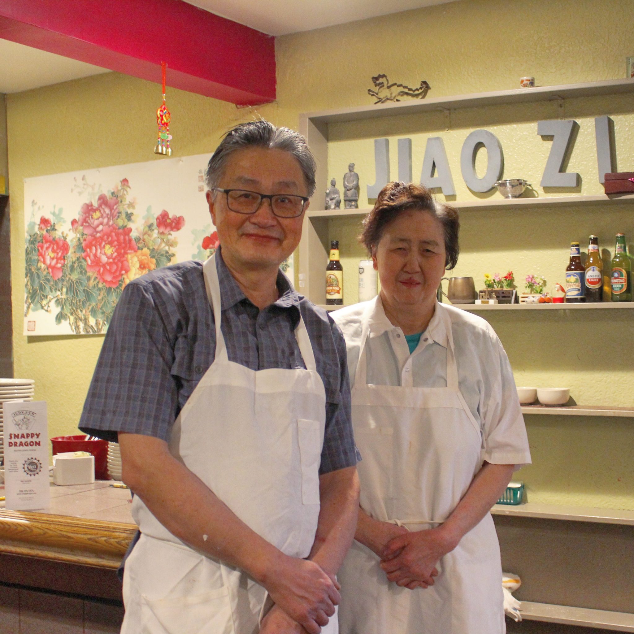 David and Judy Fu smiling in their restaurant
