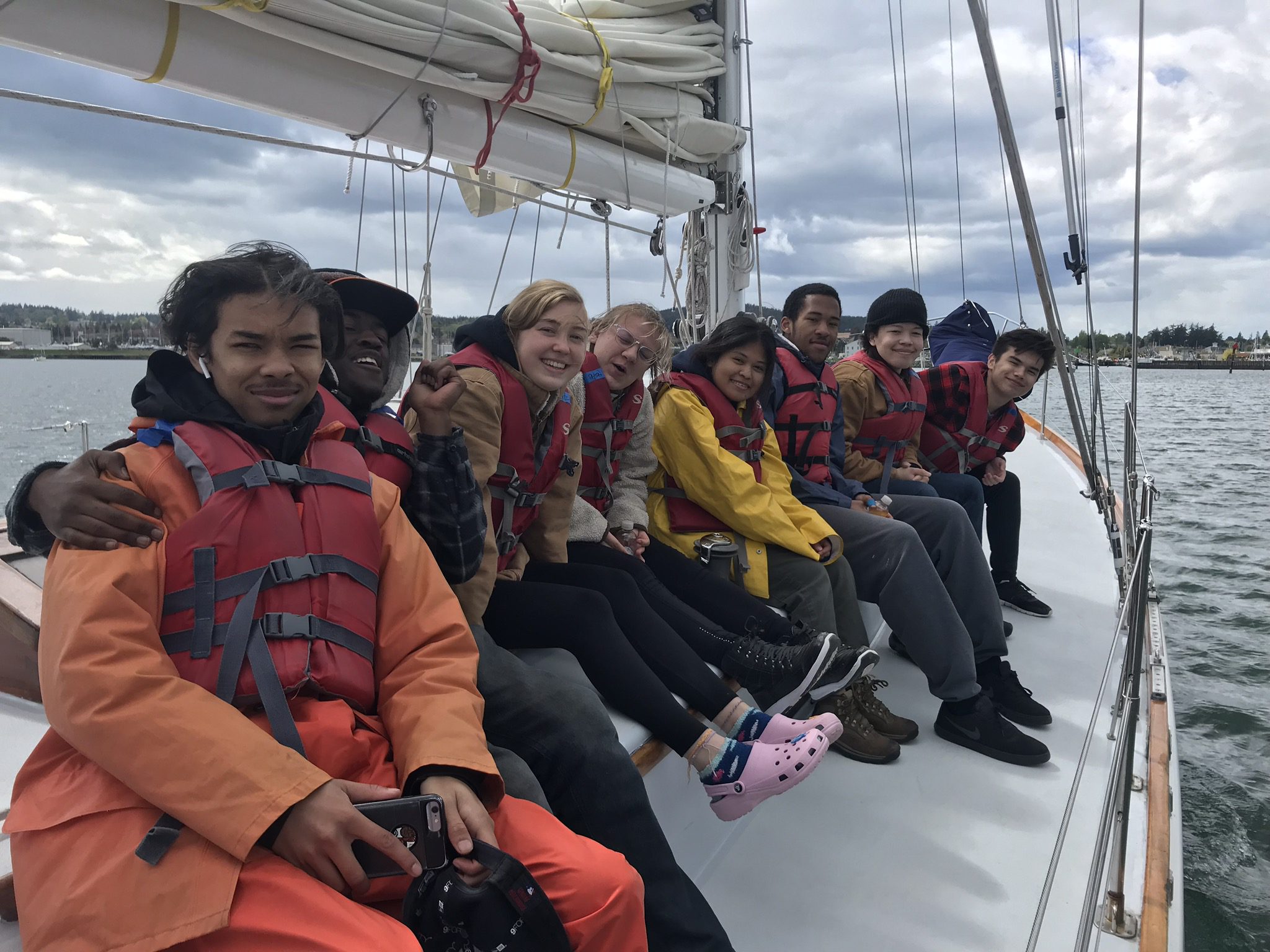 Seattle youth on a boat and gaining maritime experience with Northwest Maritime Center.