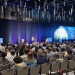 Conference attendees in large room