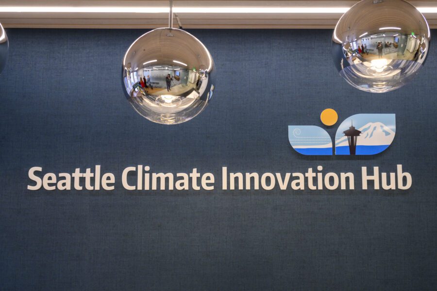 Sign in the lobby of the Seattle Climate Innovation Hub that says "Seattle Climate Innovation Hub."