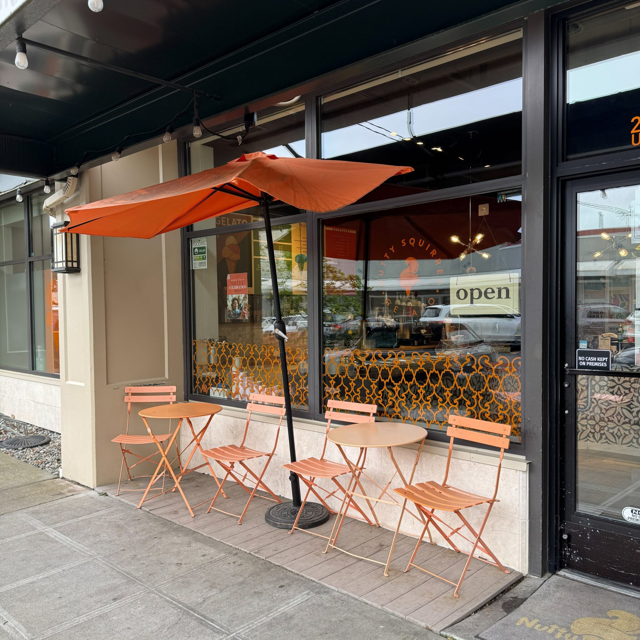 Nutty Squirrel Gelato storefront with bright outdoor seating in front.